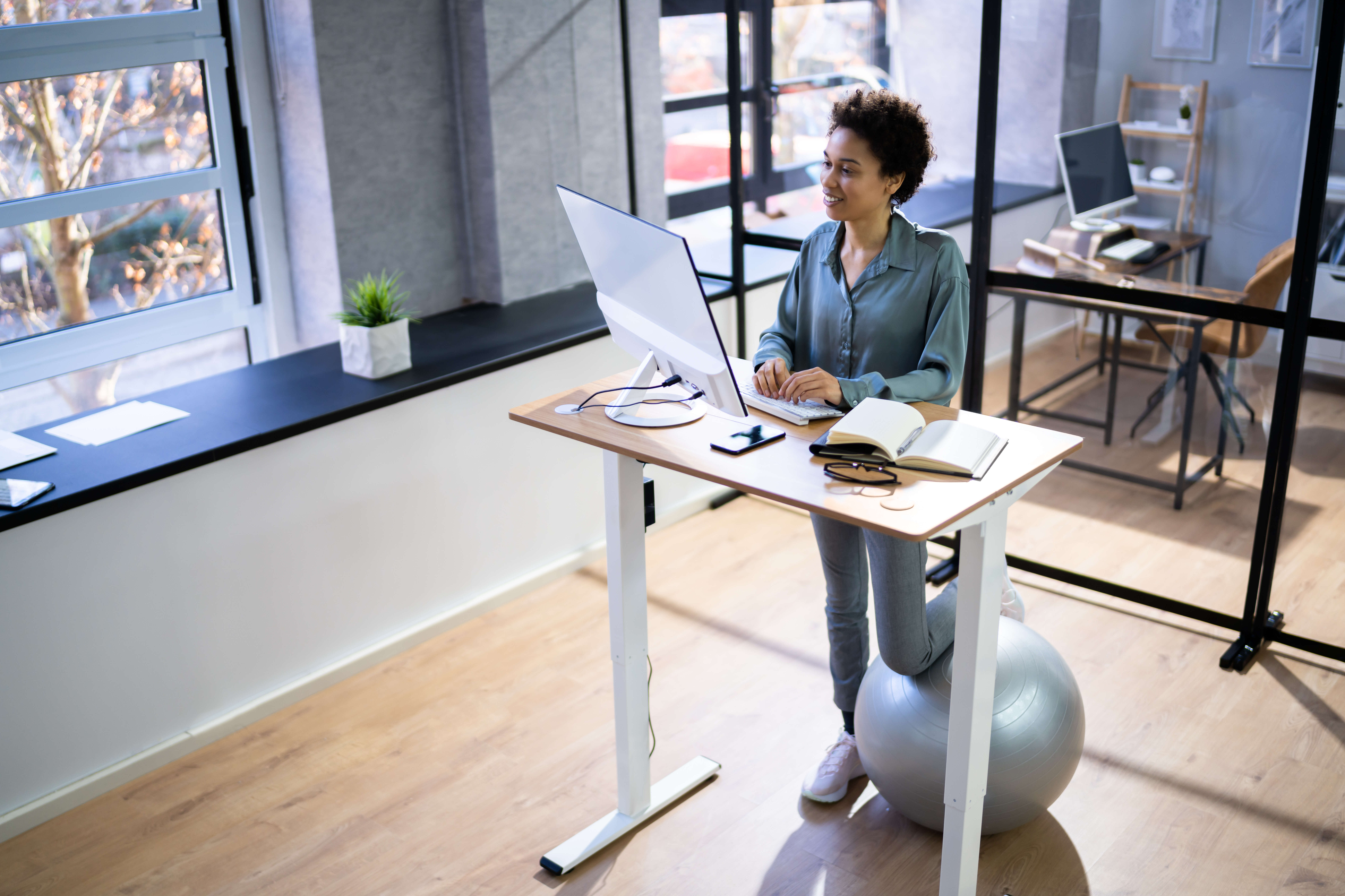 woman working at a standing desk