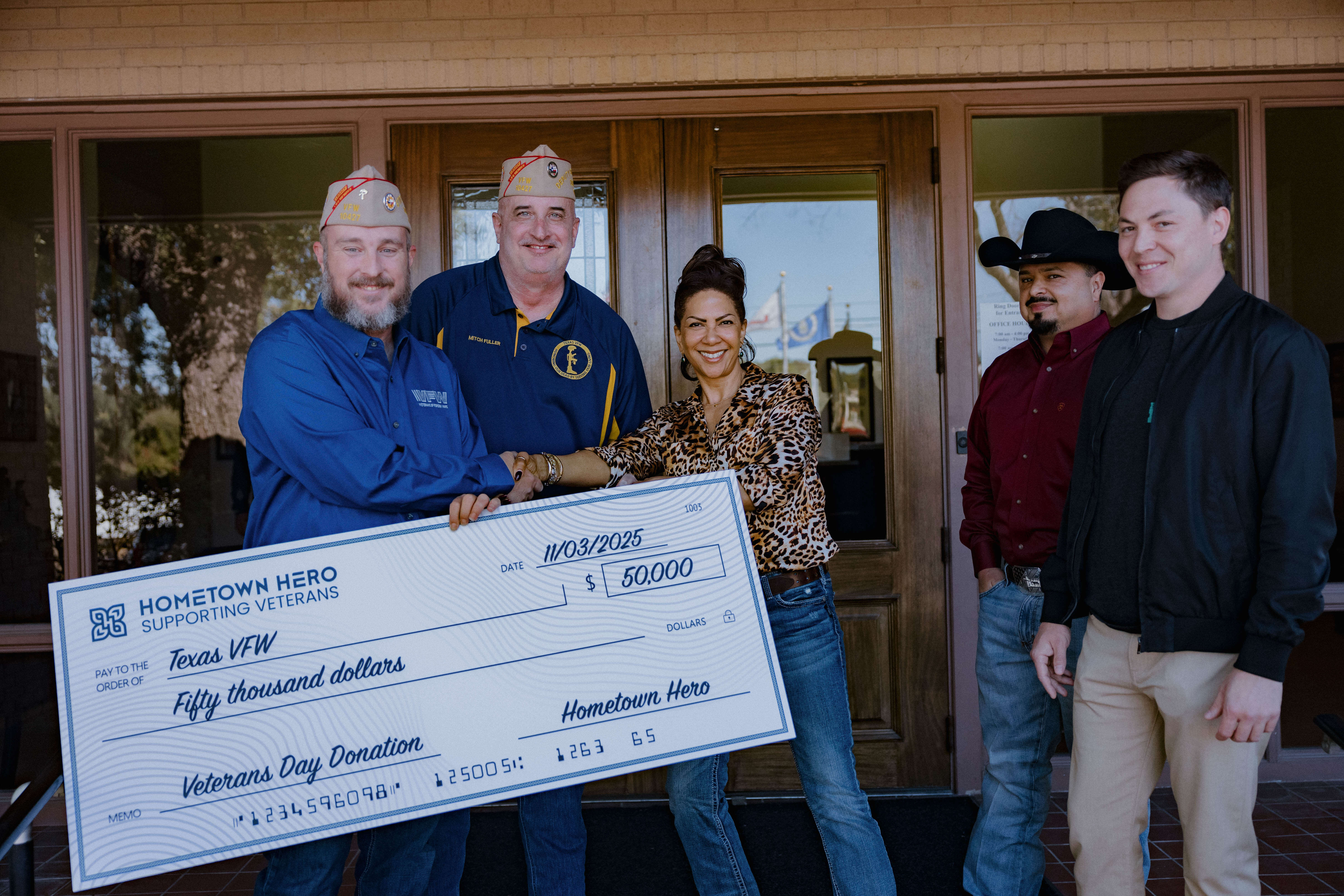 Cynthia shaking hands with VFW