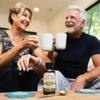 couple laughing with thc syrup in their drinks
