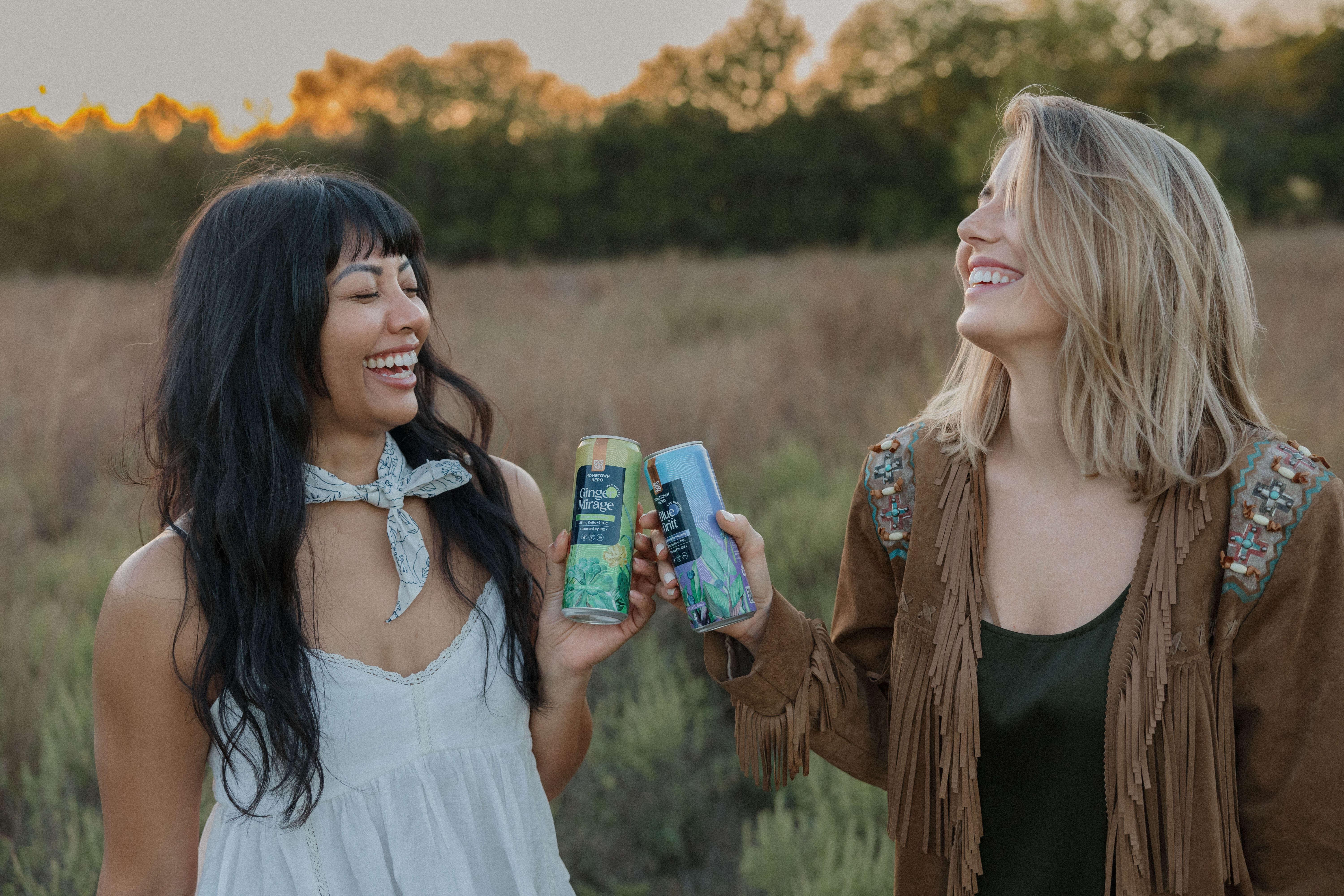 happy girls clinking alcohol free drinks