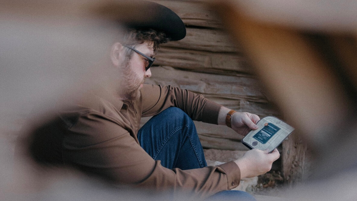 Man looking at bag of gummies