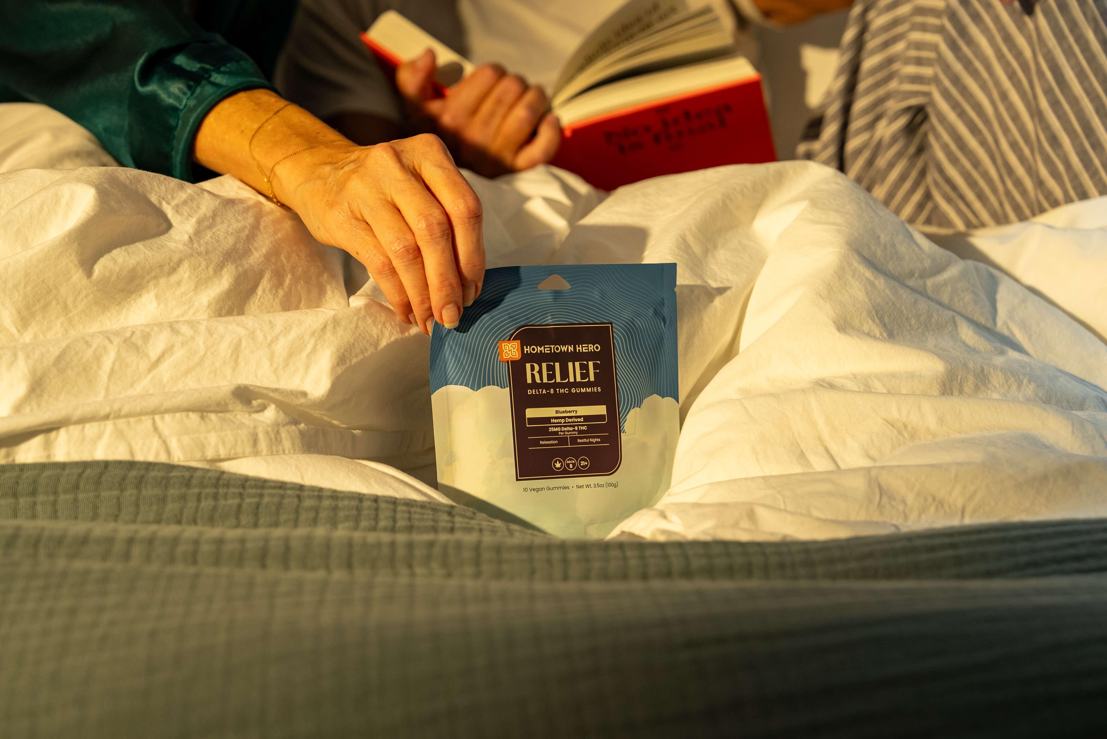 blueberry relief gummies in a bed