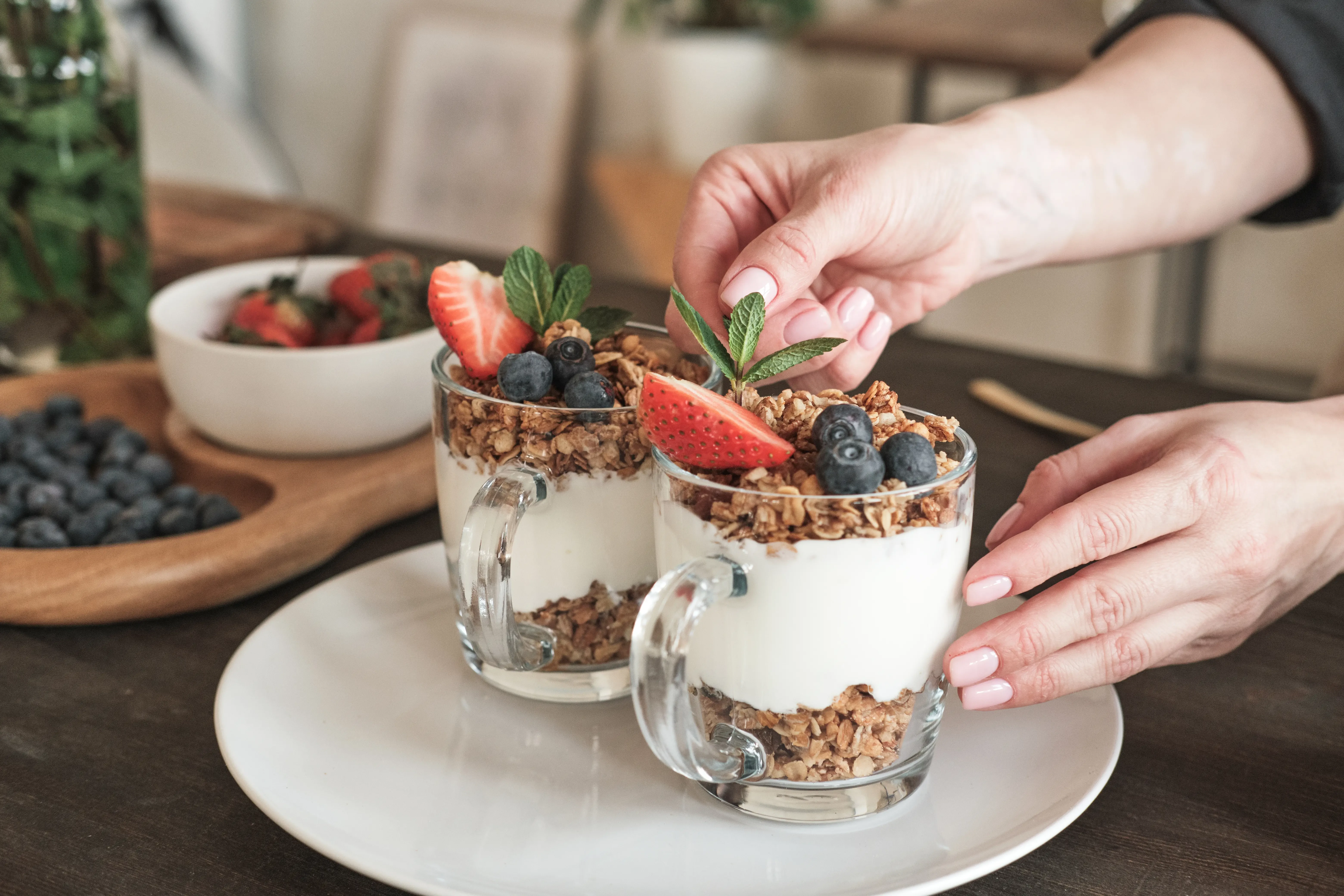 a layered parfait with granola and yogurt and fruit