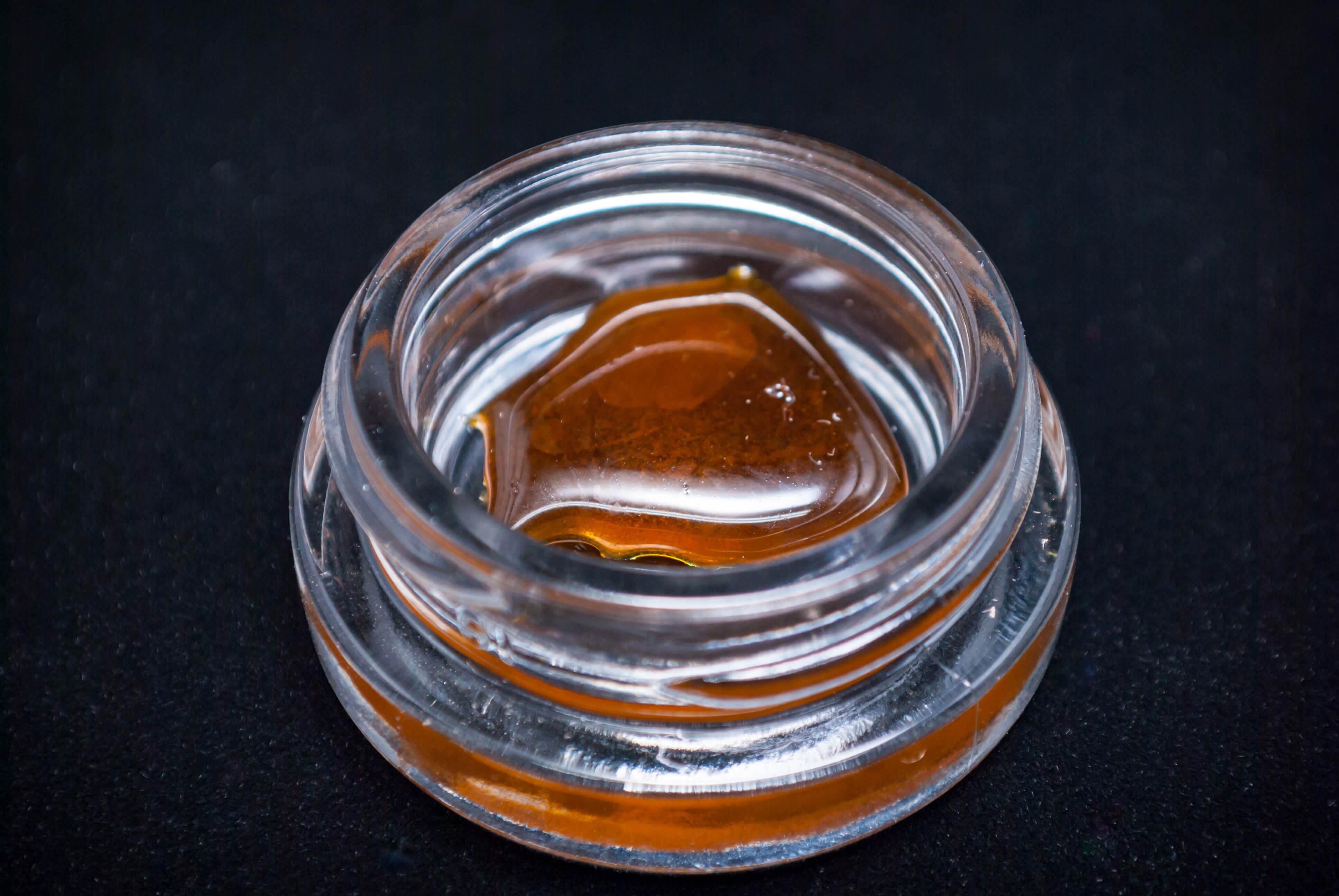 saucy concentrate in a glass jar