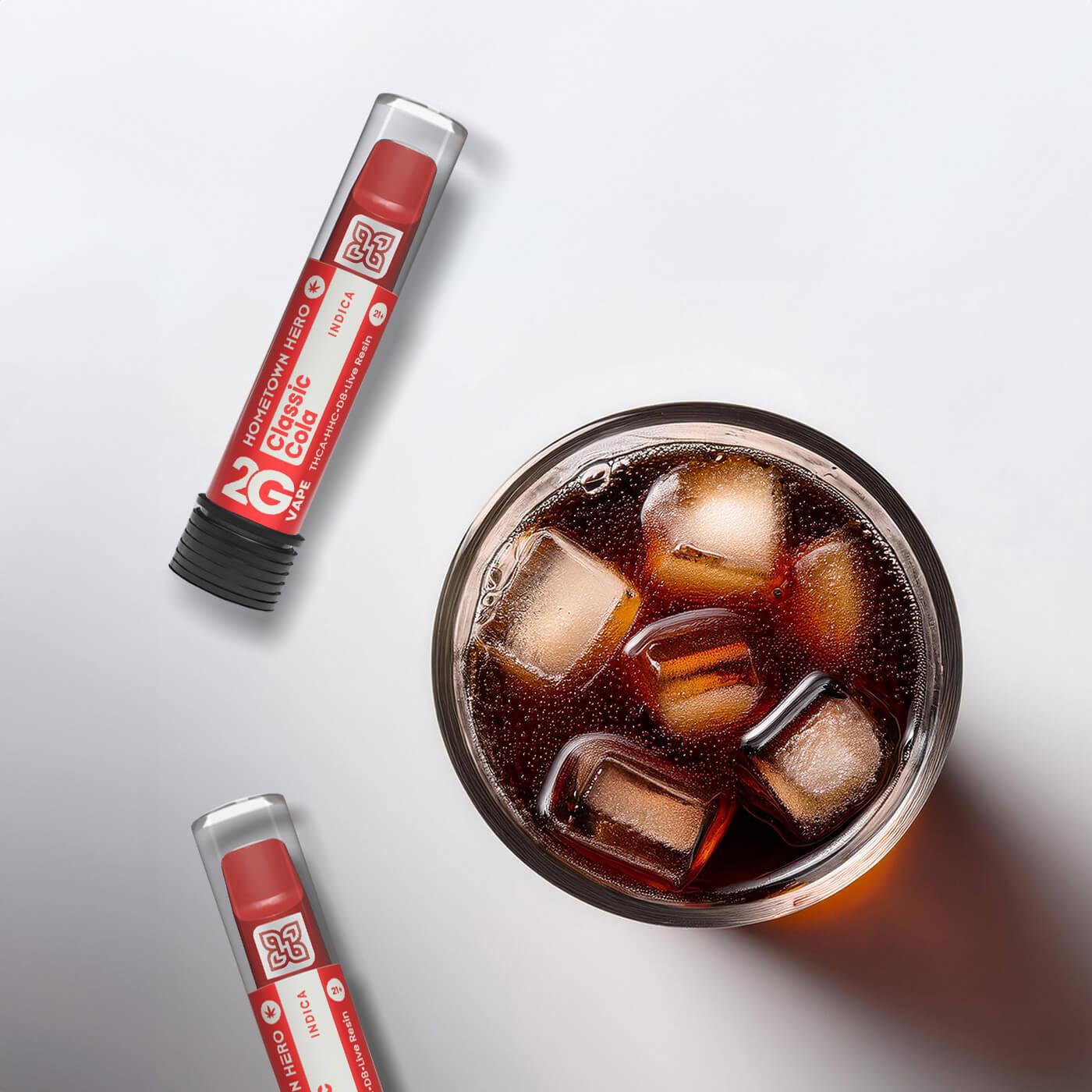 a cold glass of cola and a vape