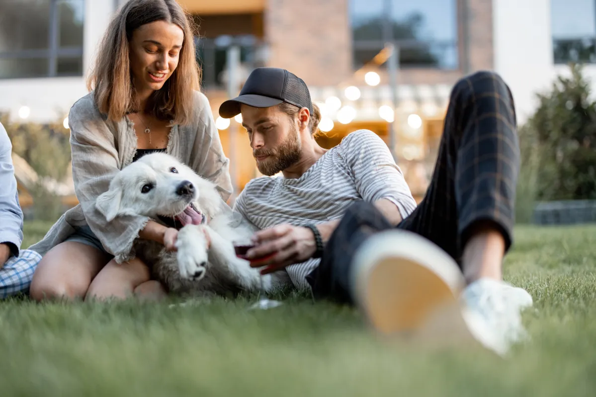 couple bonding over their dog