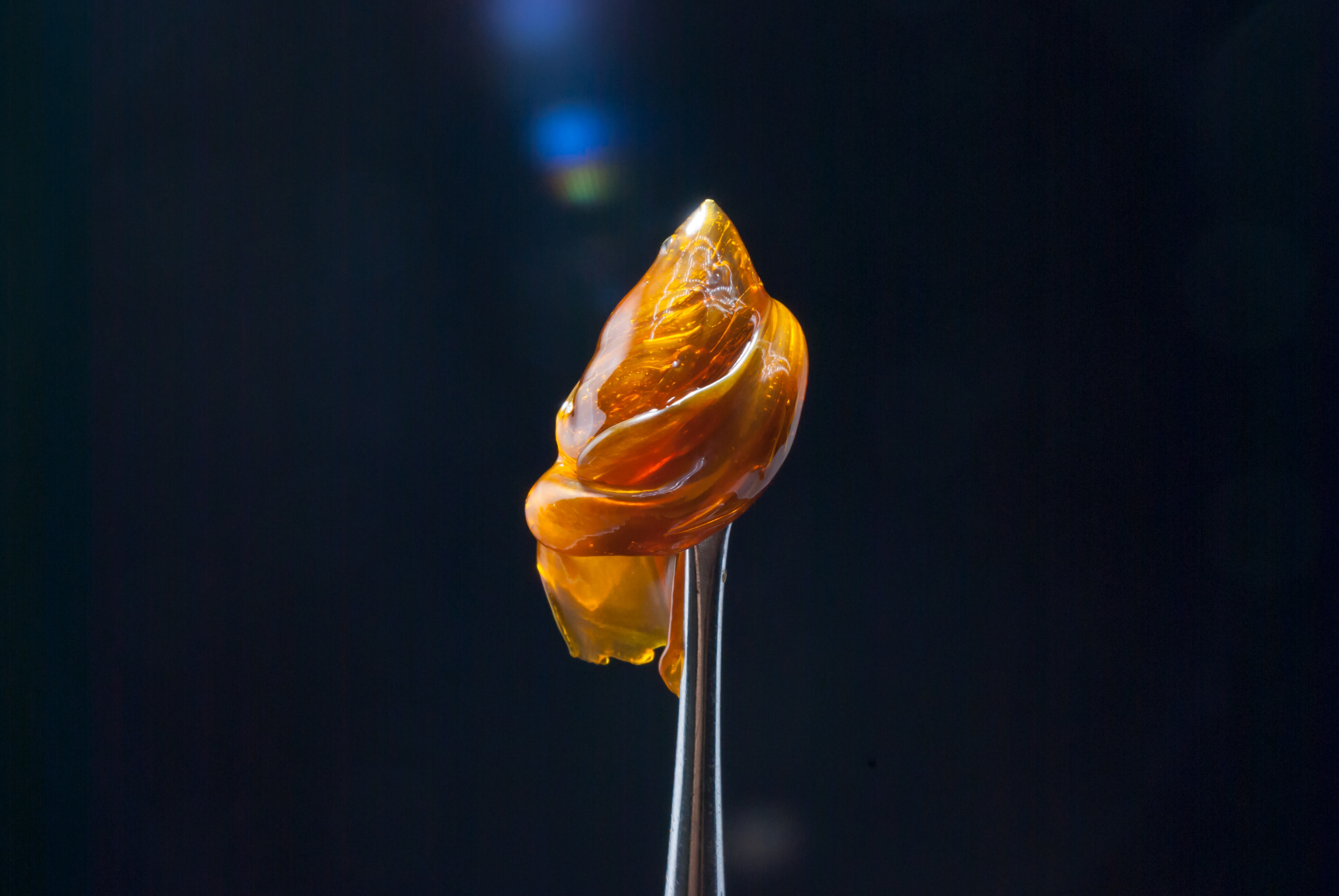 a golden dab on a nail