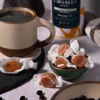 Delta 9 caramels next to a cup of coffee