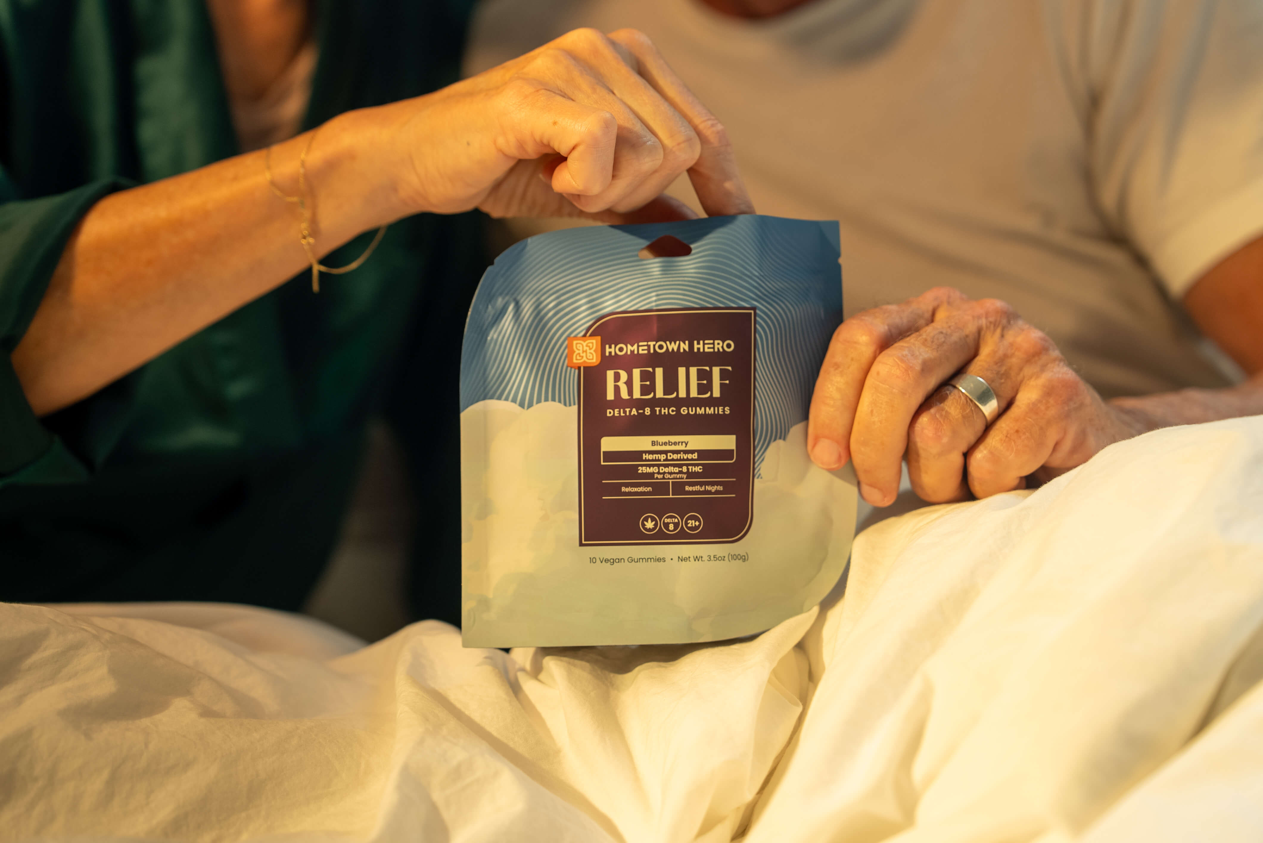 hands pulling out d8 gummy