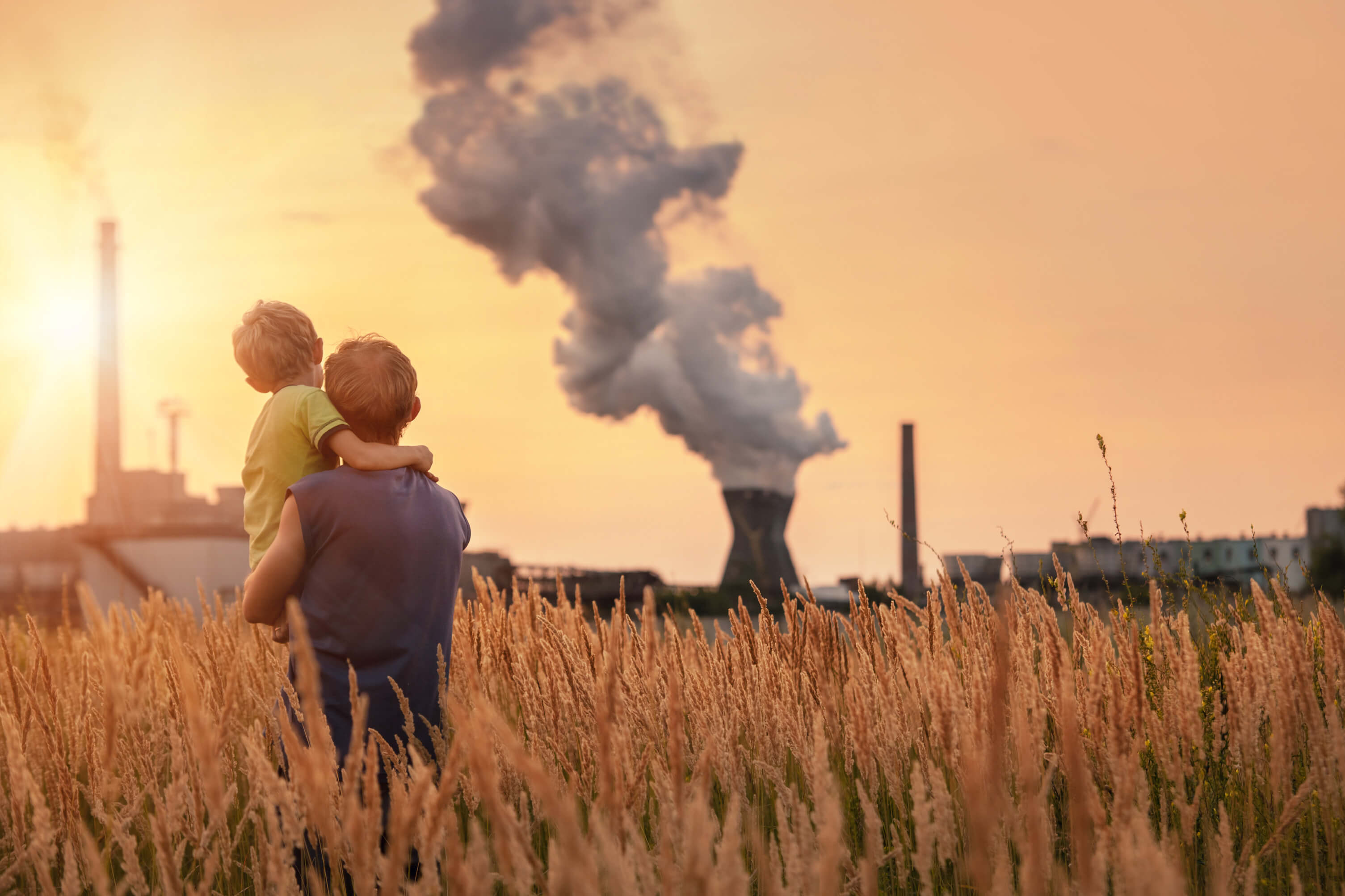 man and son looking at air pollution