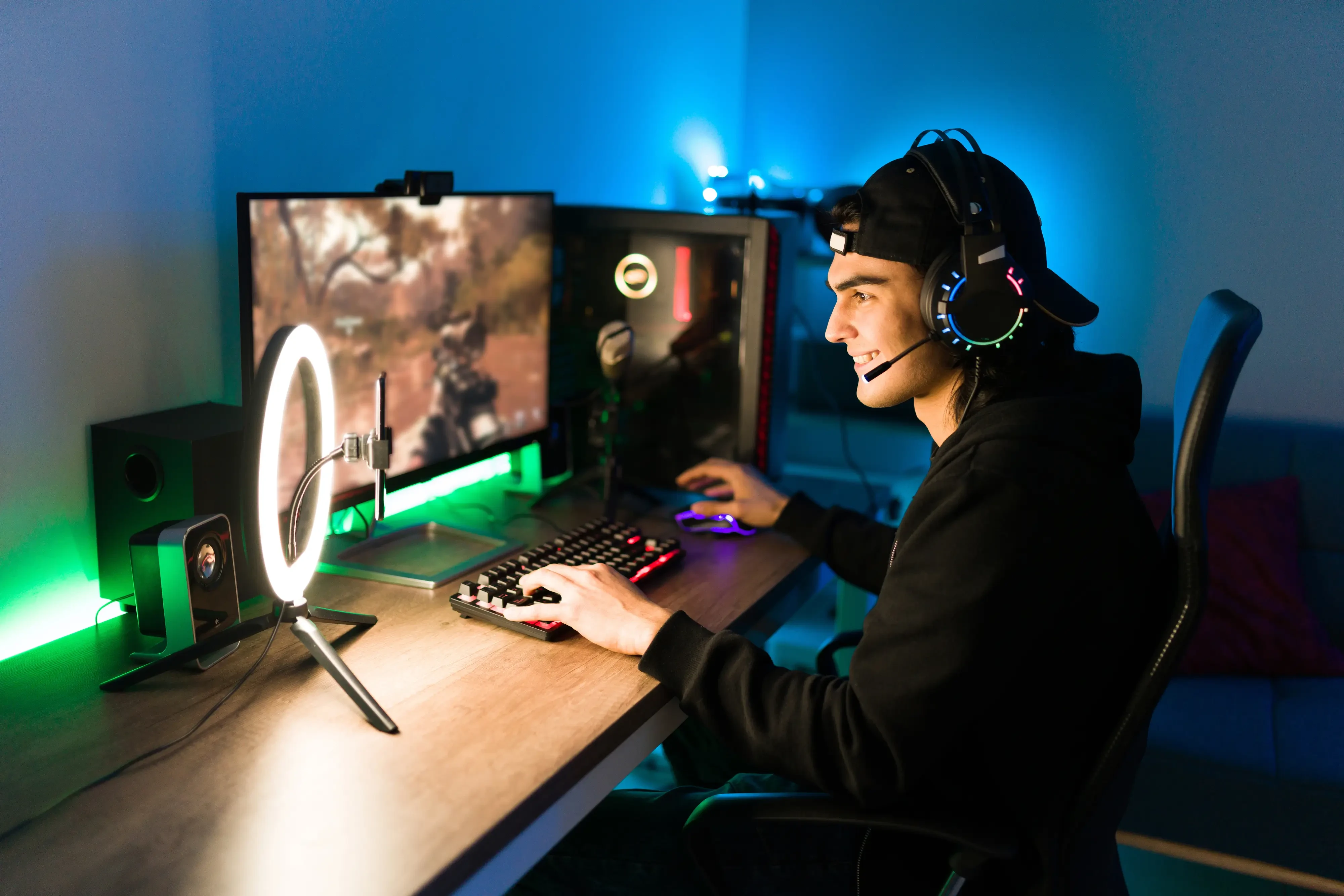 young man gaming in his room