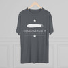 grey shirt hanging in room