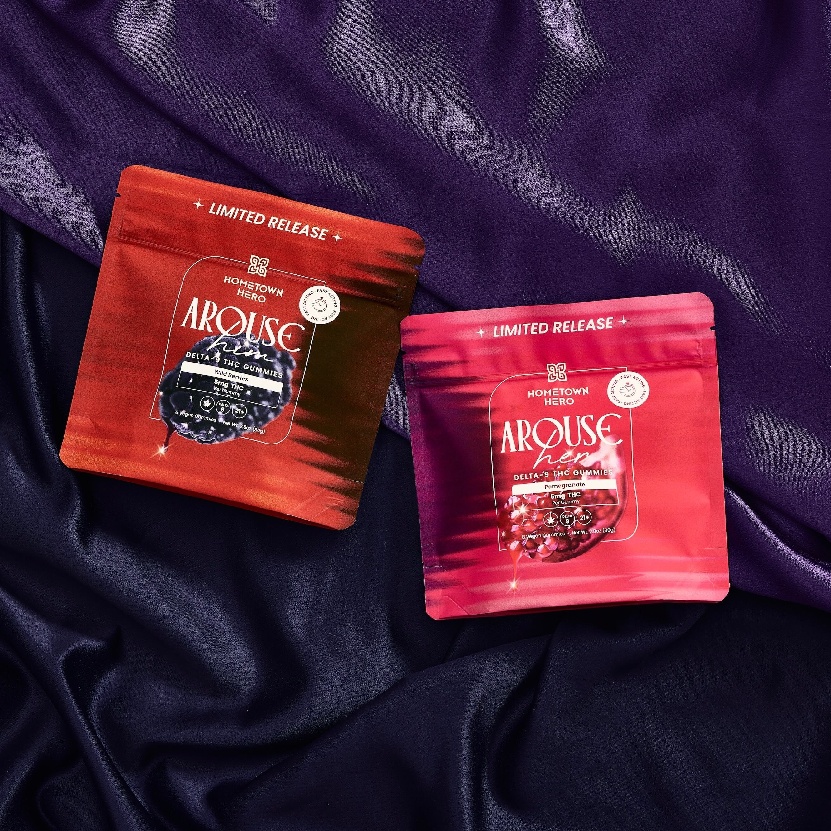 two bags of gummies on silk sheets