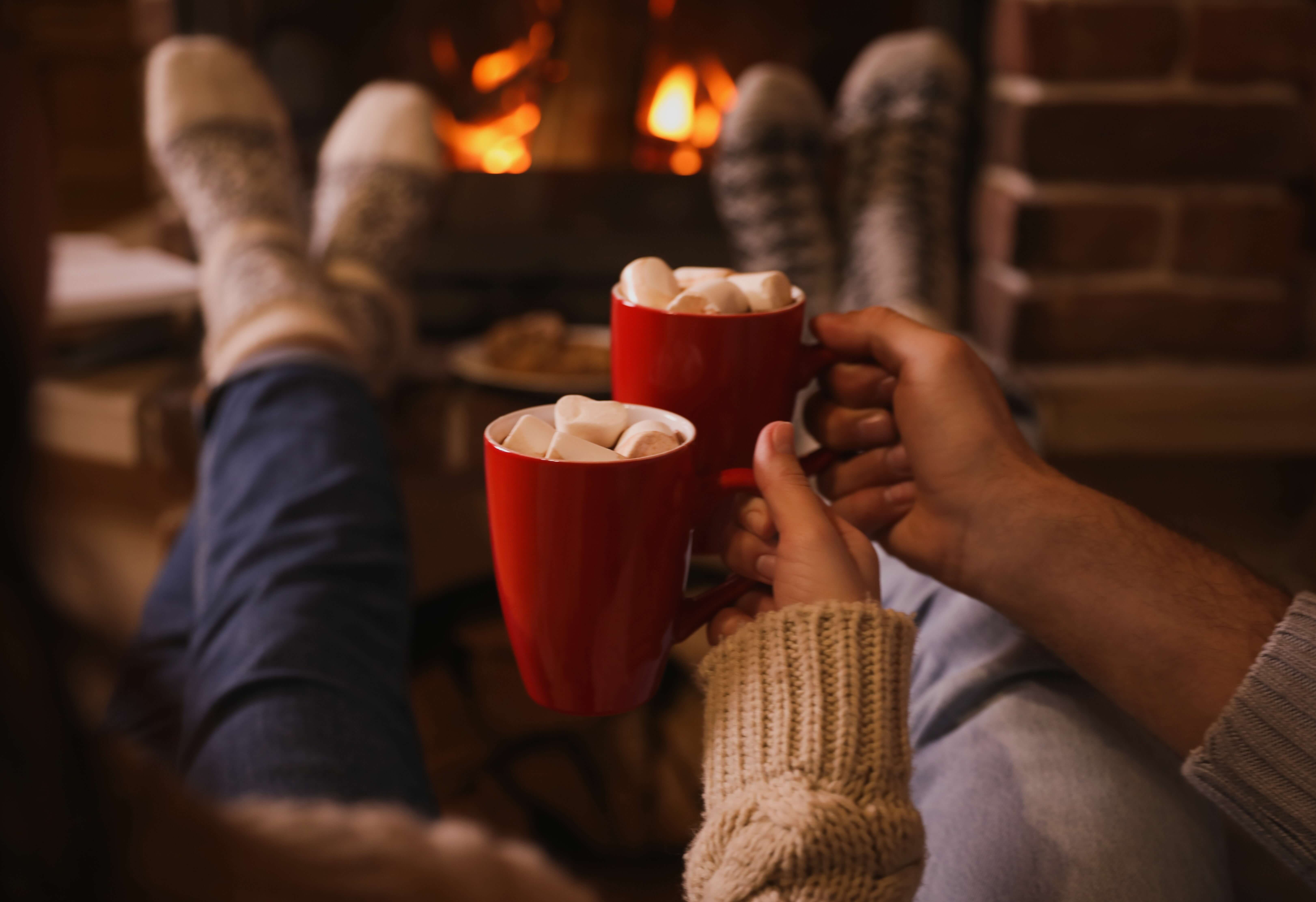 Hot cocoa mugs by the campfire