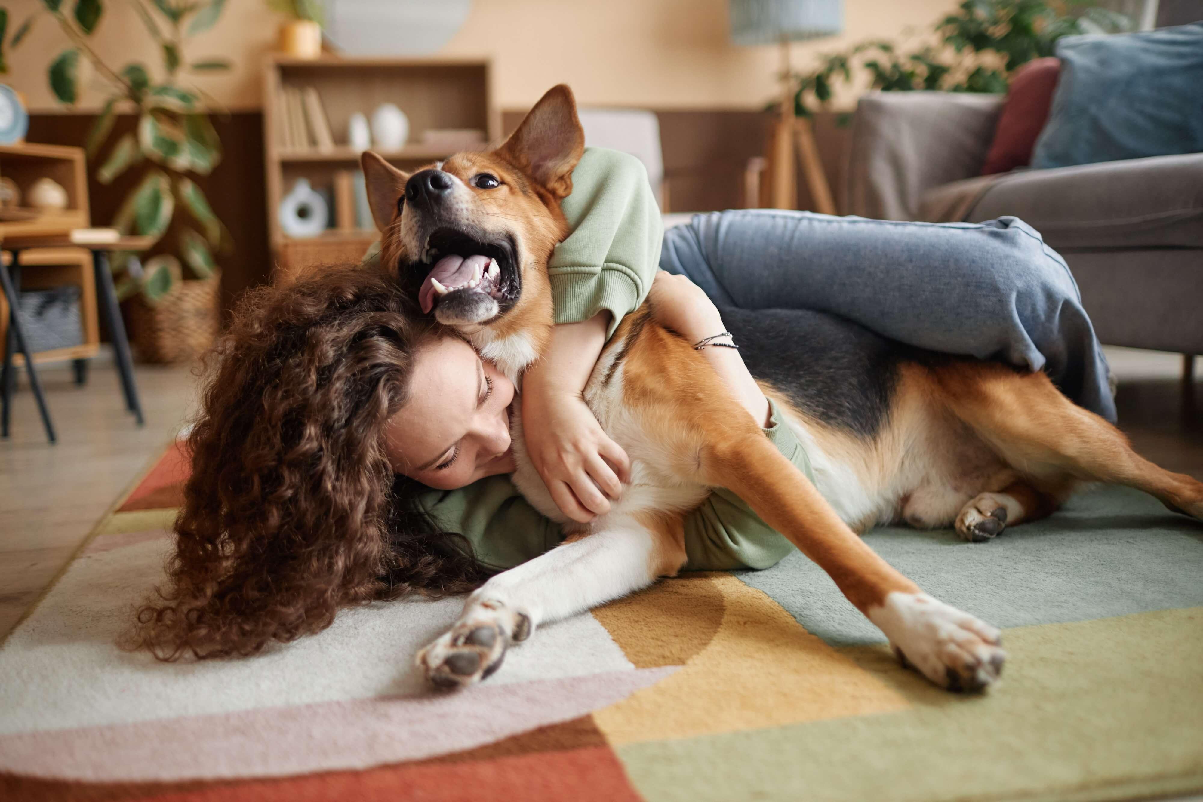 woman loving her dog