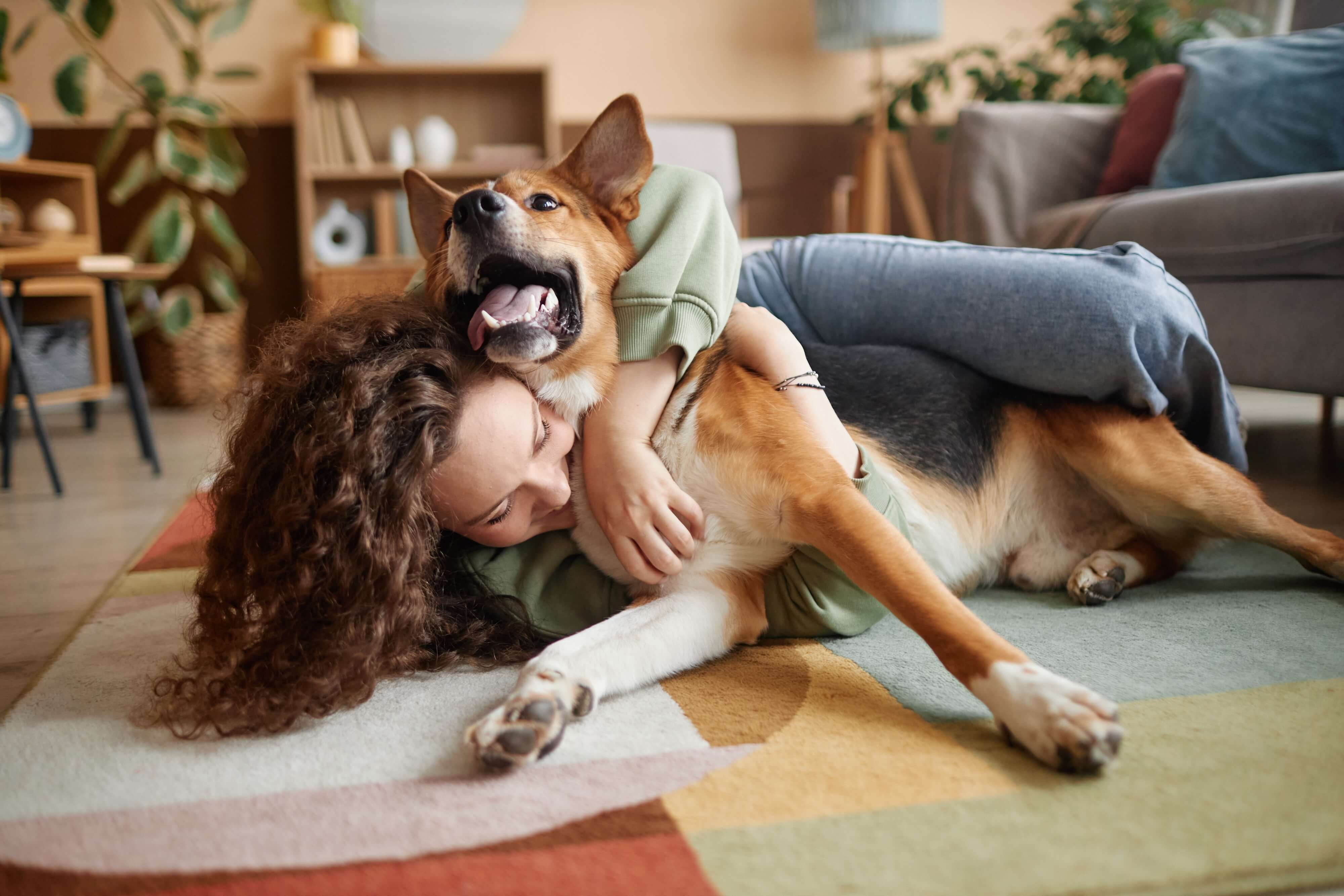 woman loving her dog