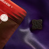 dark hued arousal gummy for men next to a red bag
