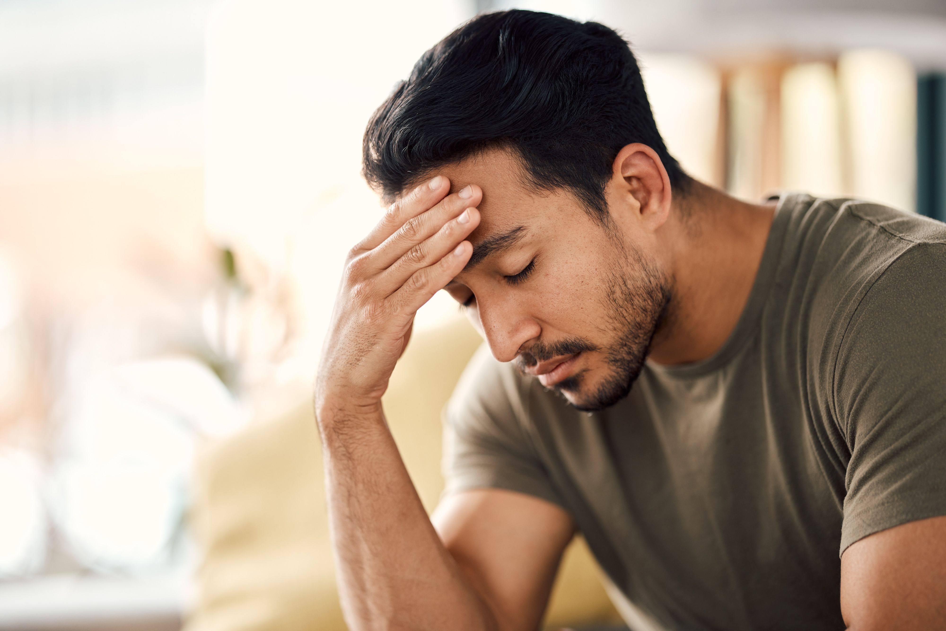 man looking stressed or sick