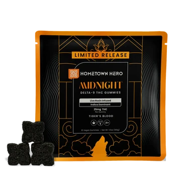black delta-9 edibles next to a halloween themed bag