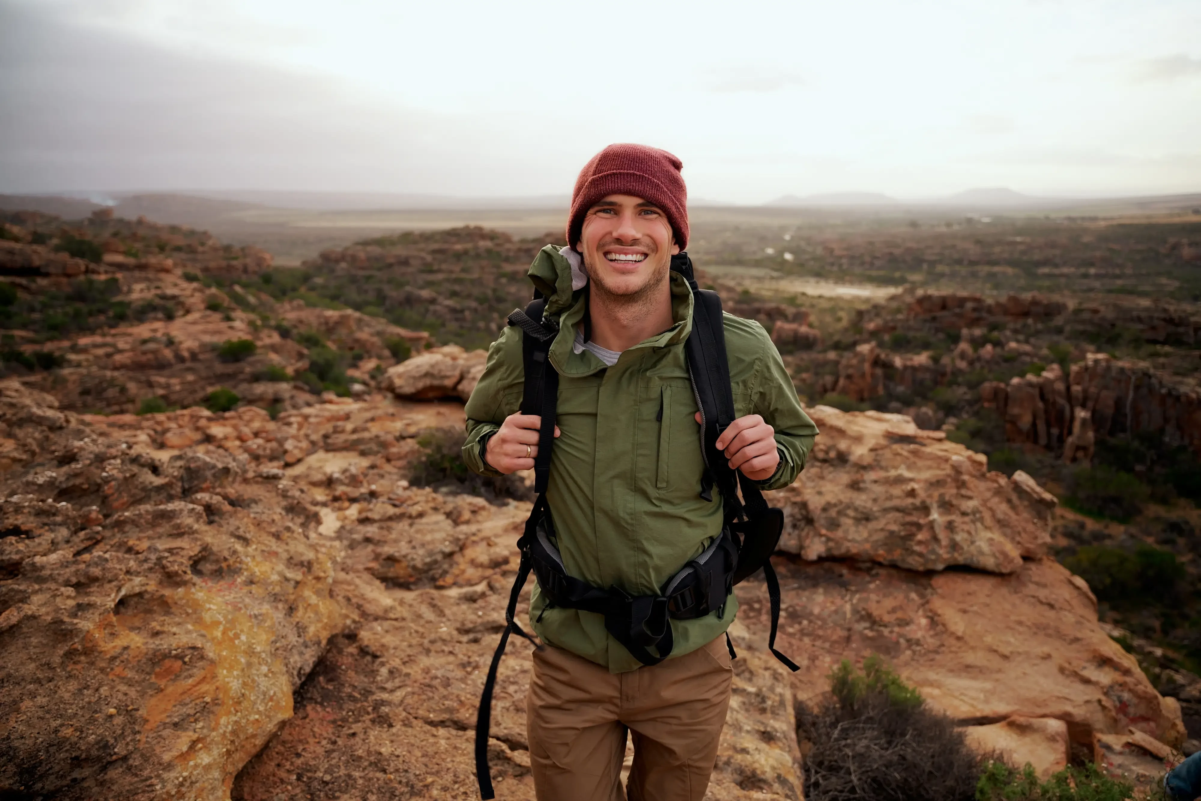 man on top of a mountain