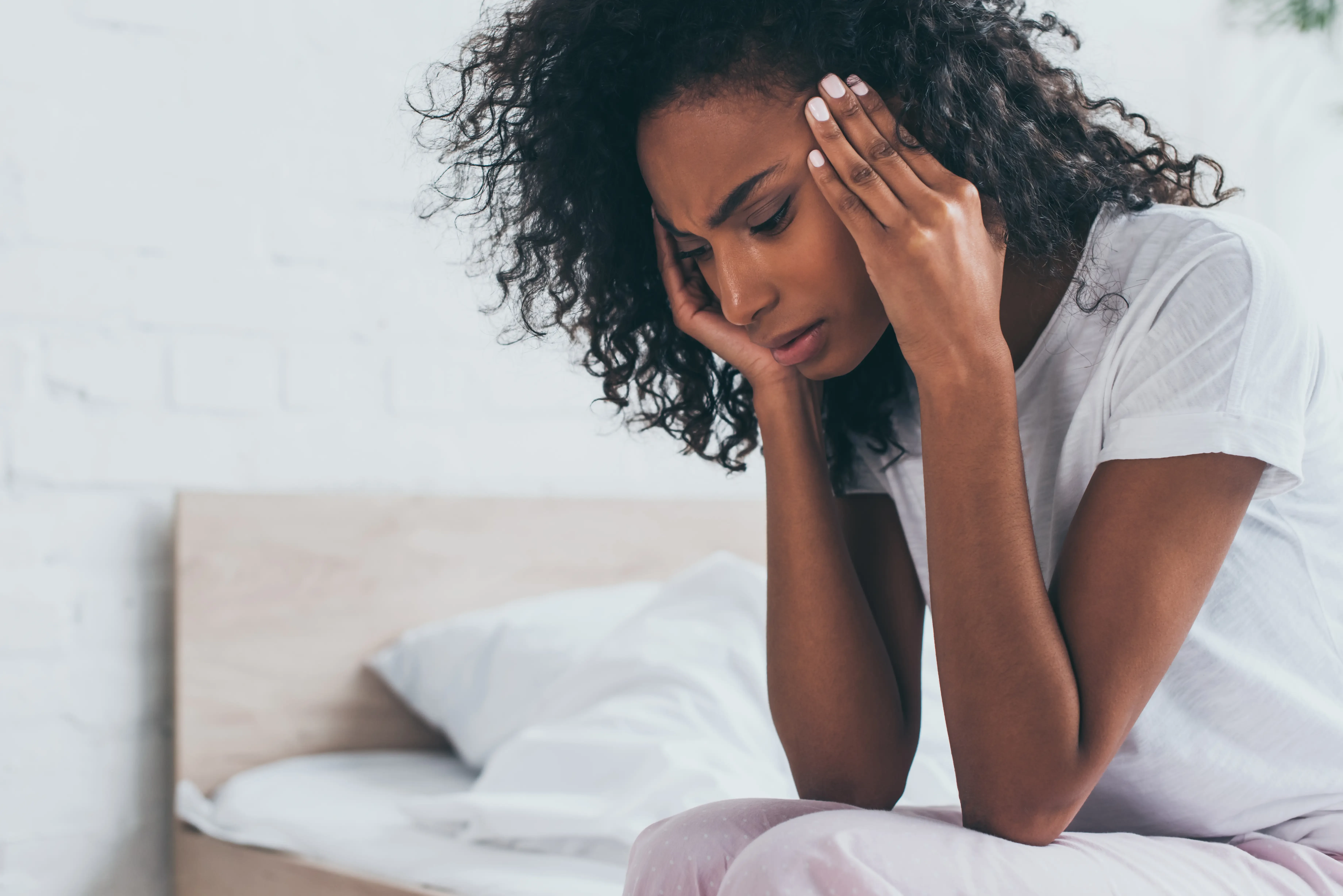 woman overwhelmed by side effects