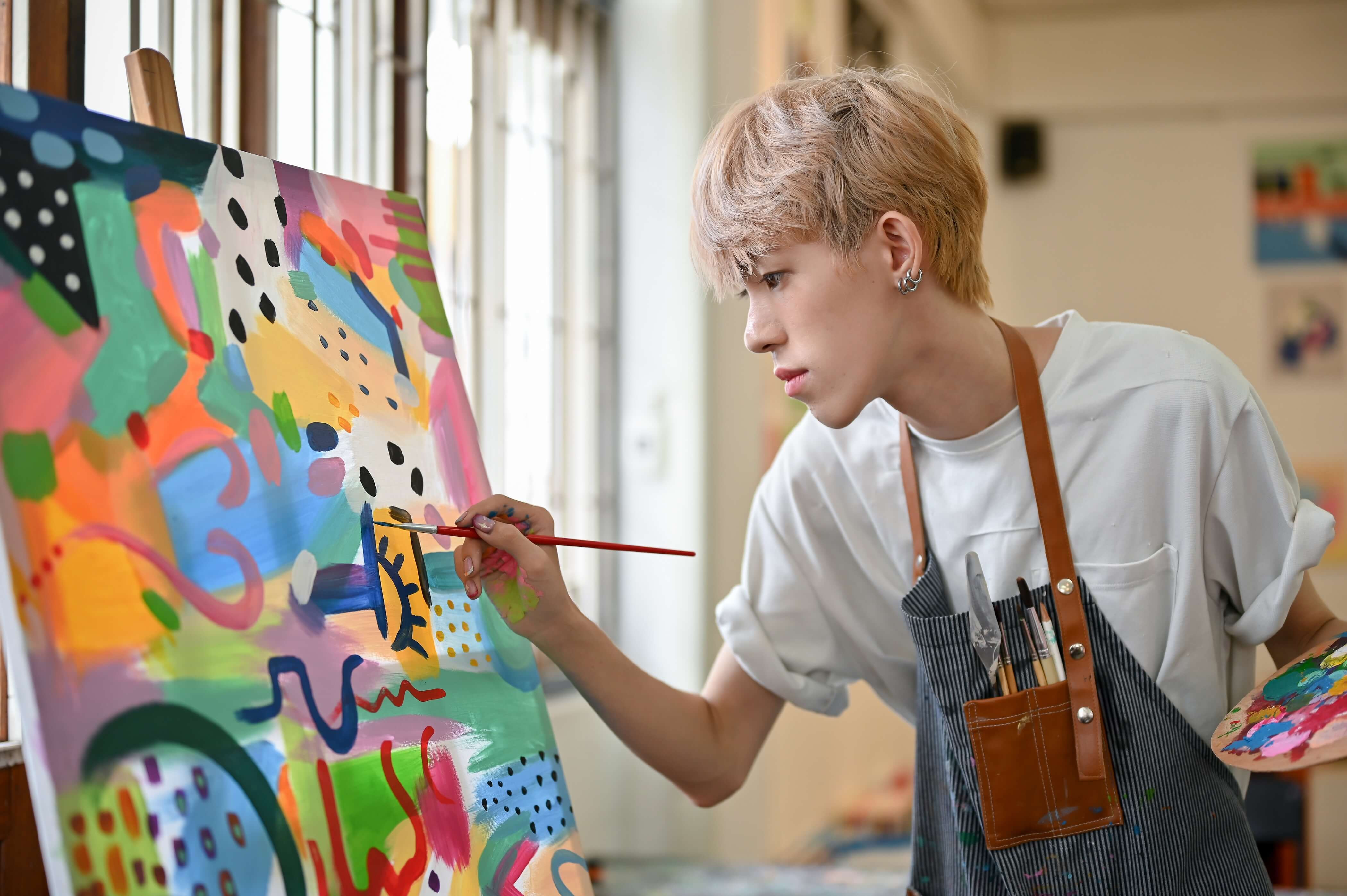 young man painting