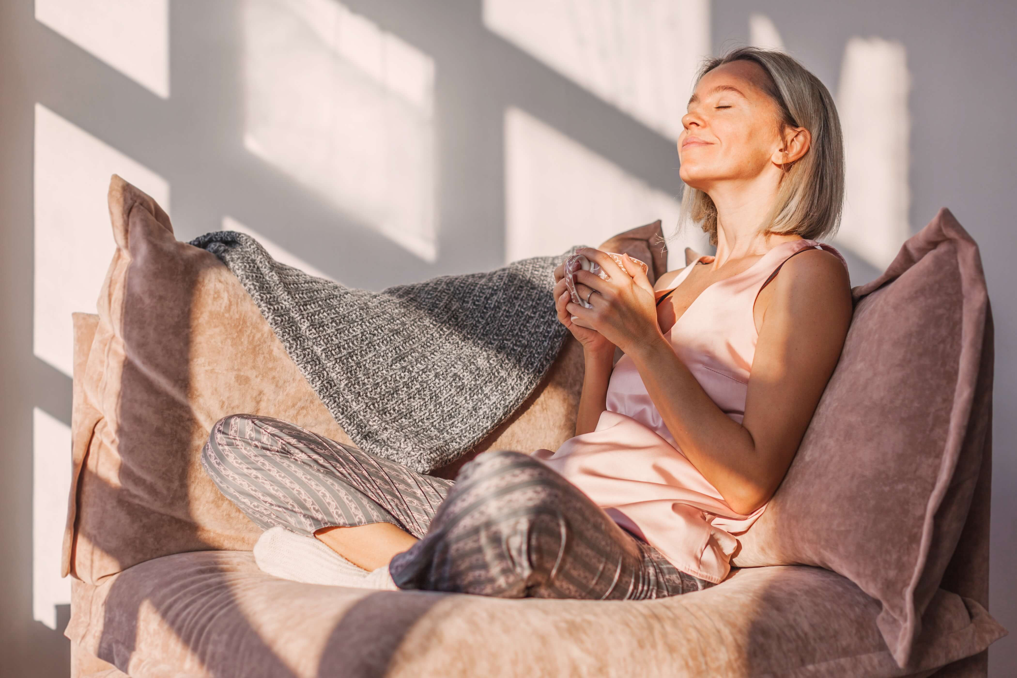 woman relaxing with cup