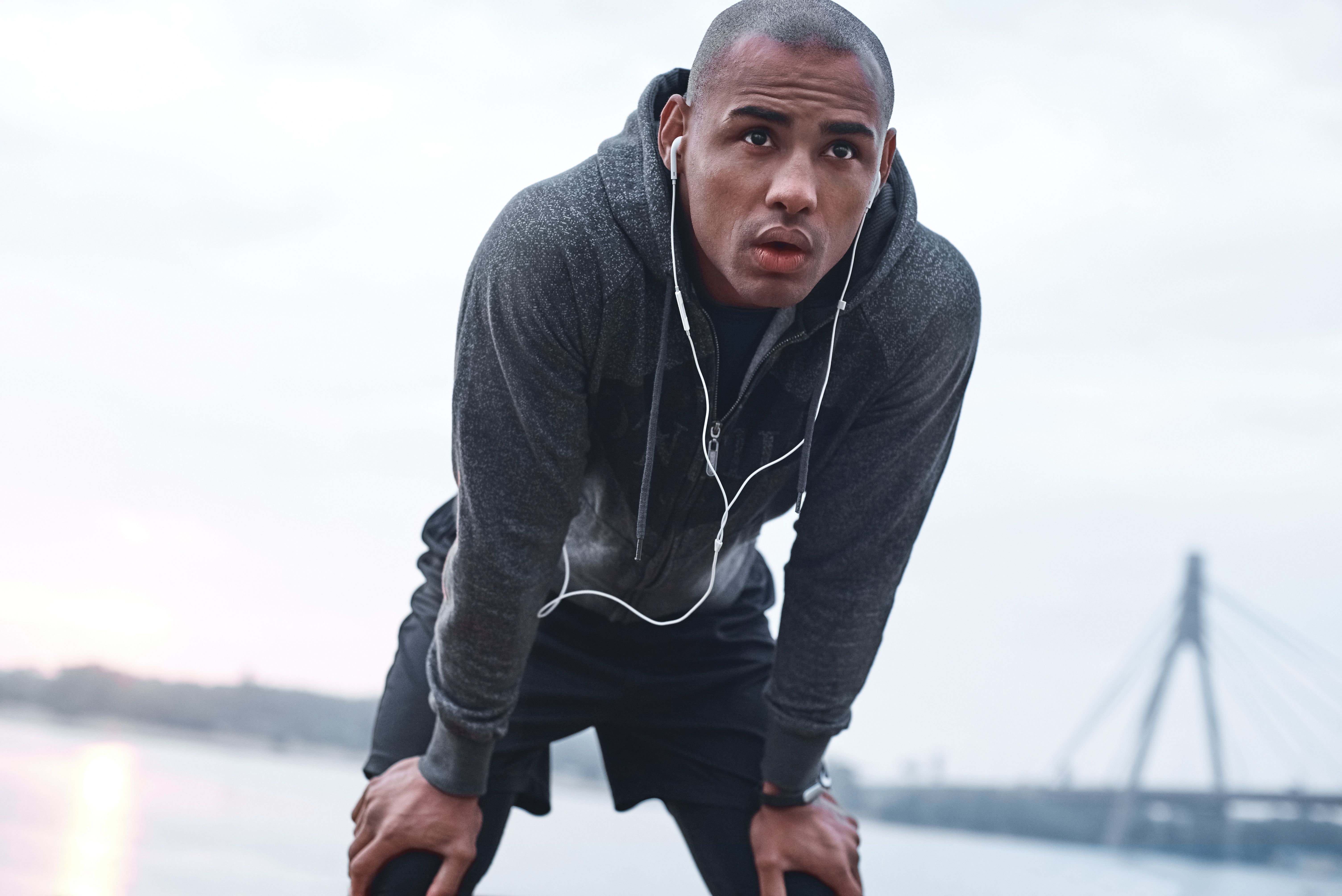 Man exhaling, winded after a rigorous workout