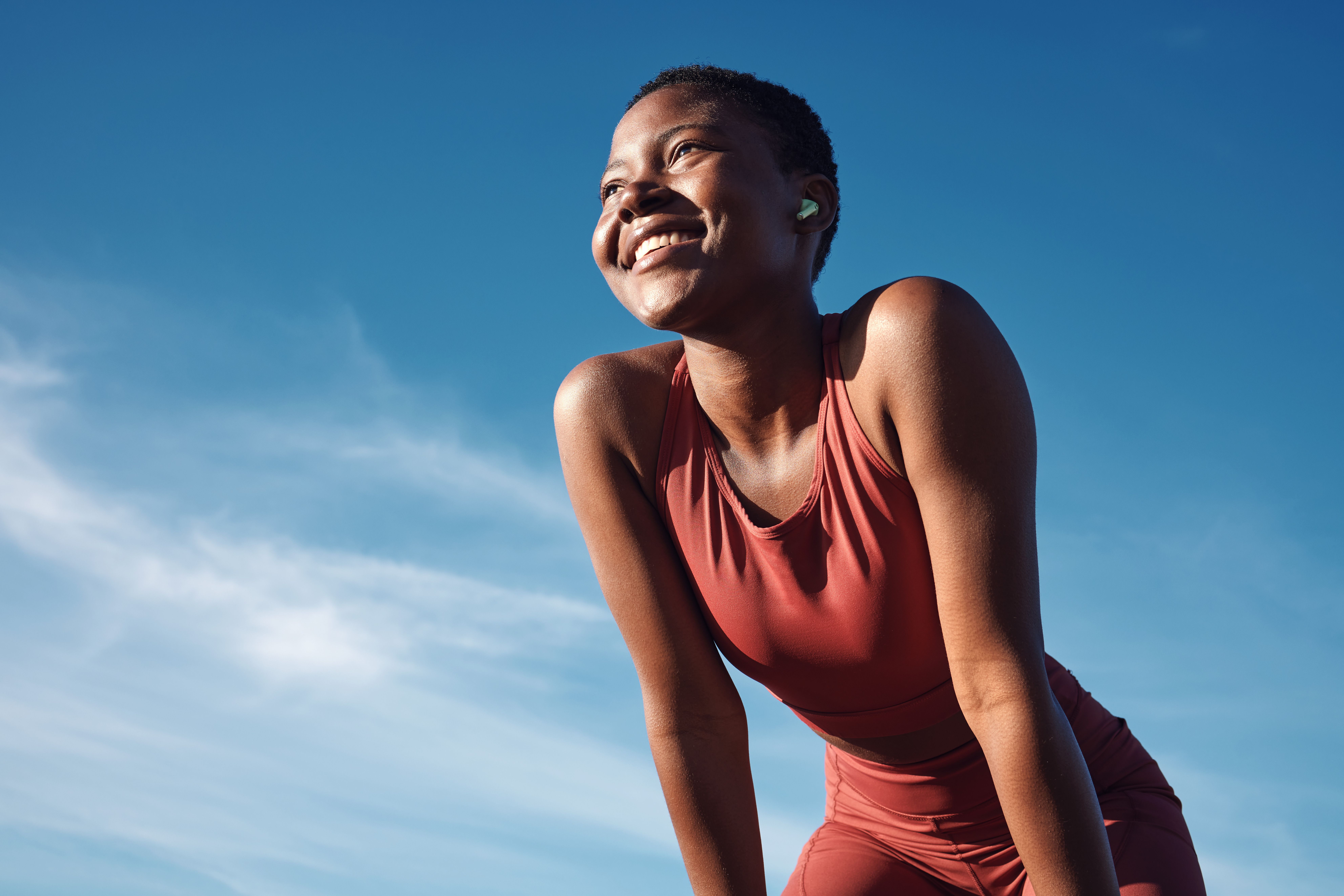 woman on a run smiling
