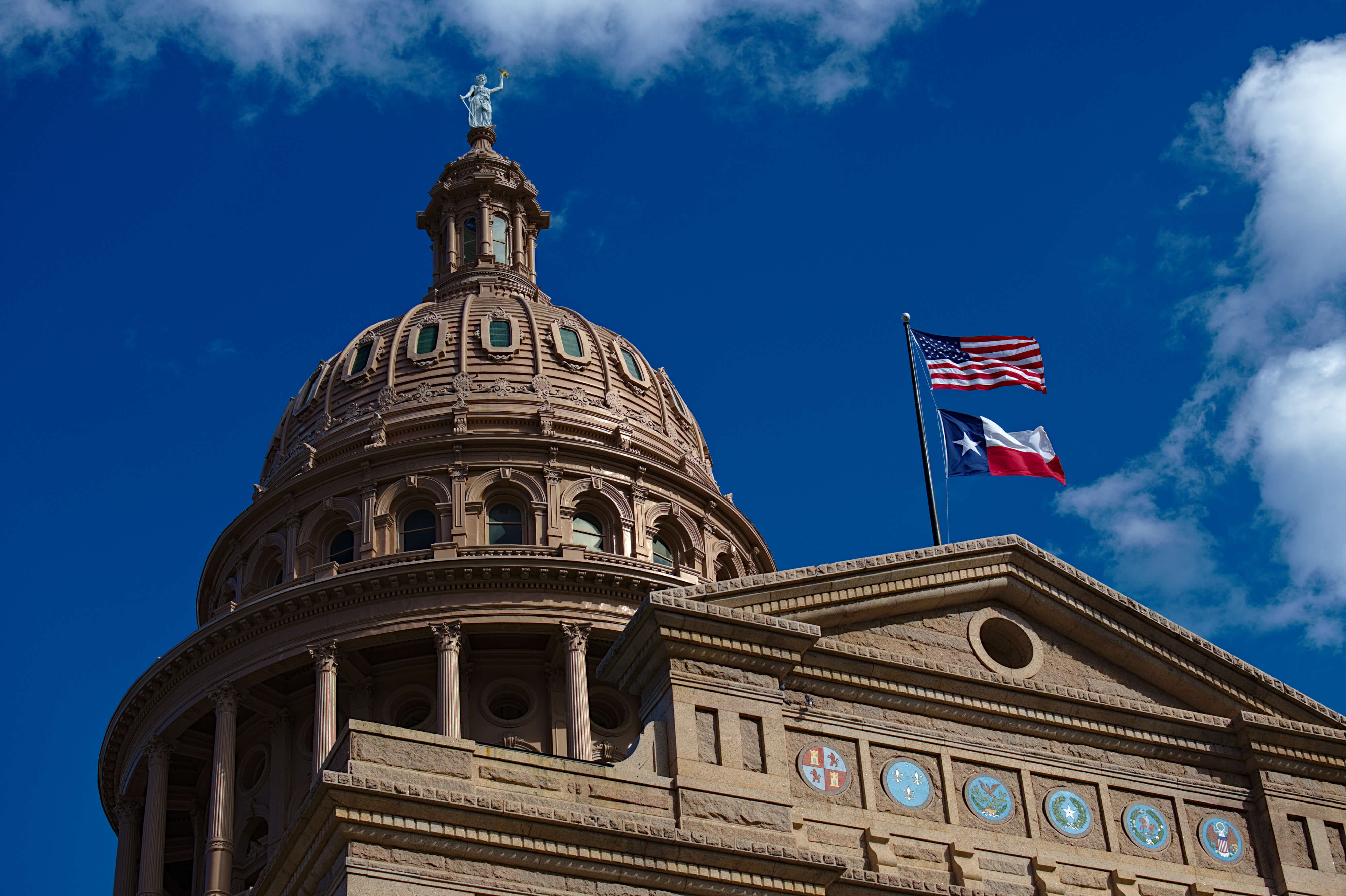 Texas State Capitol Building - The pink marble granite Texas Capitol building is located at the end of Congress Avenue in downtown Austin, Texas.
