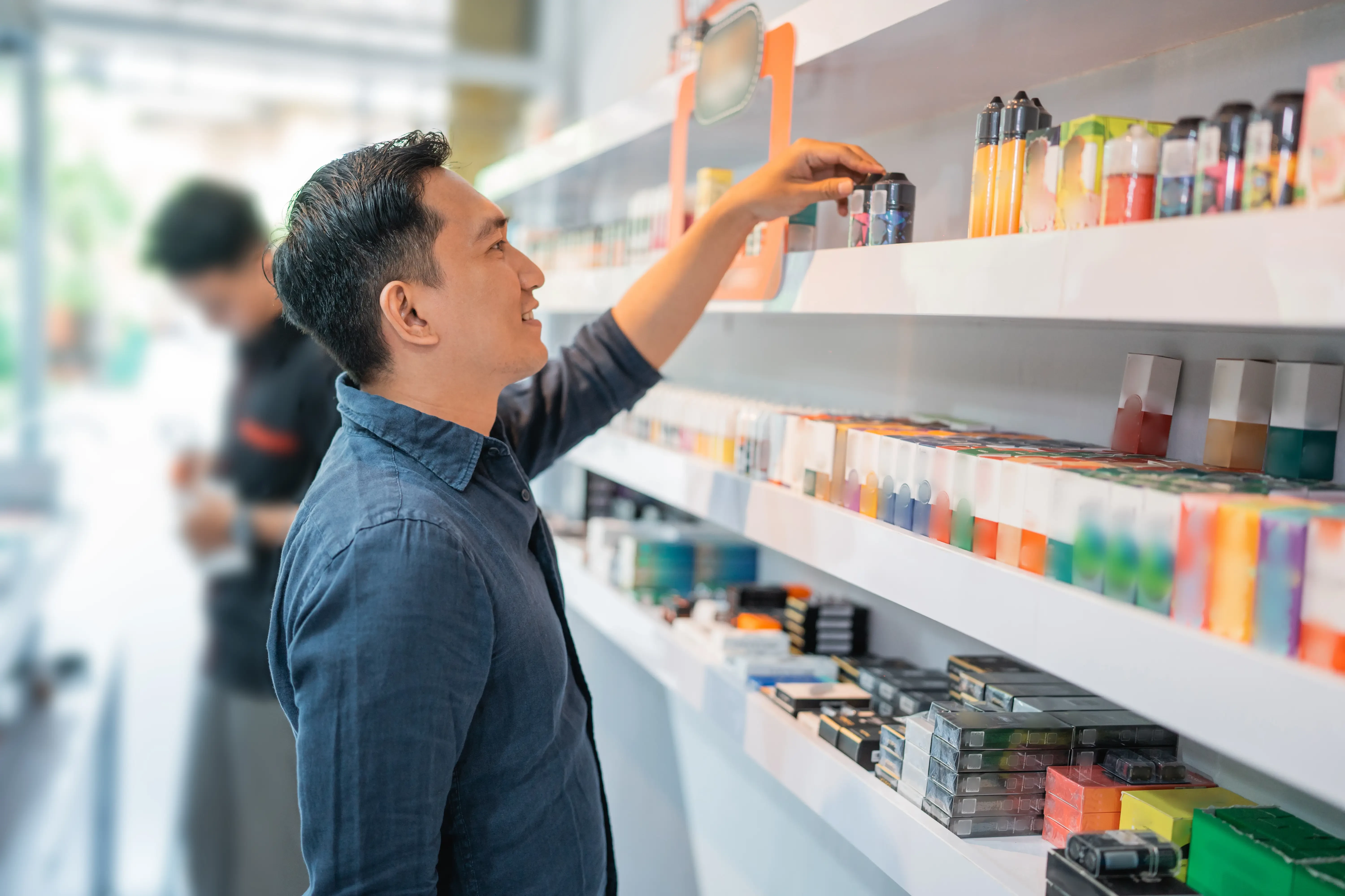man shopping at a vape shop