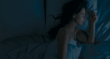 woman sleeping in her bed