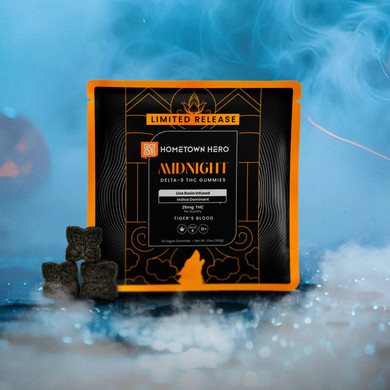 midnight gummies with smoke and jack o lanterns around