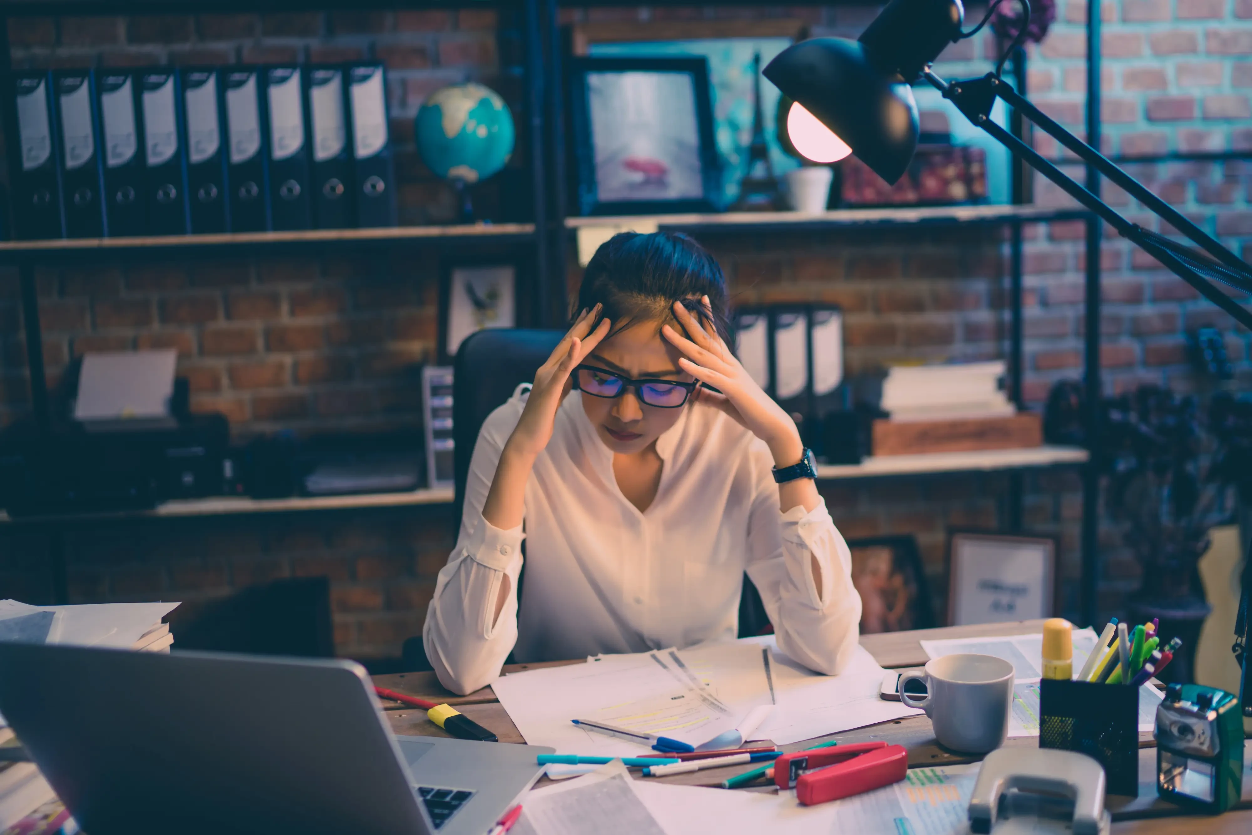 stressed out woman at desk
