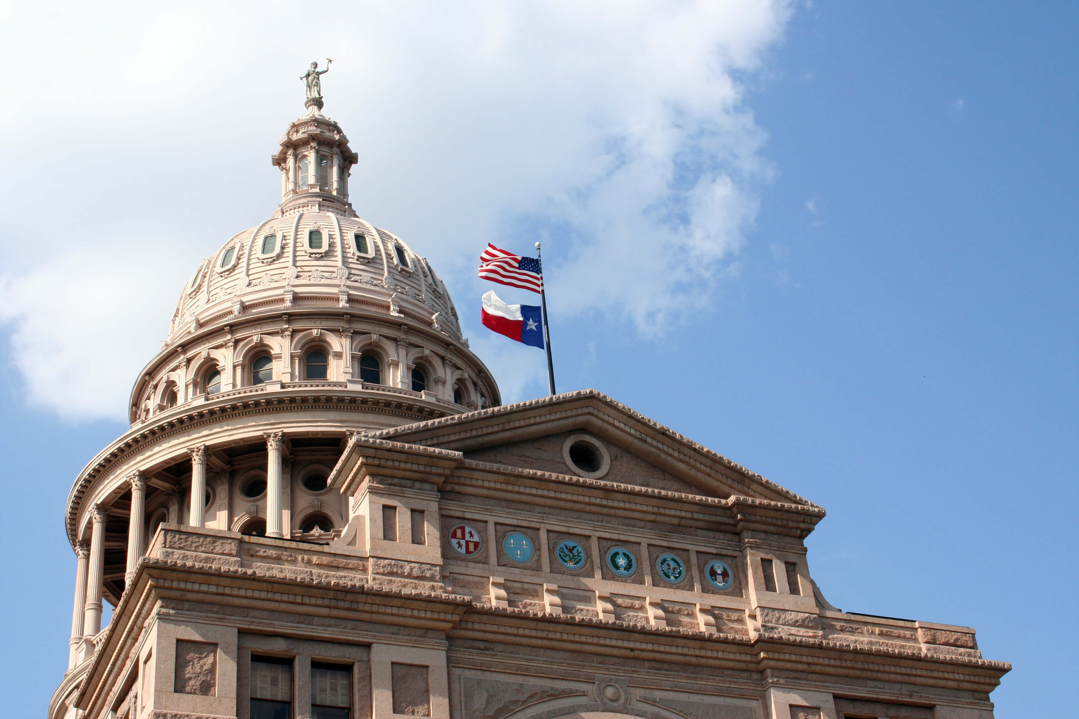 Texas capitol with flags